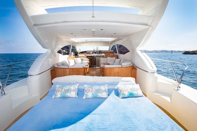 Mangusta 72 solarium in Mallorca. Boat is for rental. Very spacious sunbeds and Solaruim area.