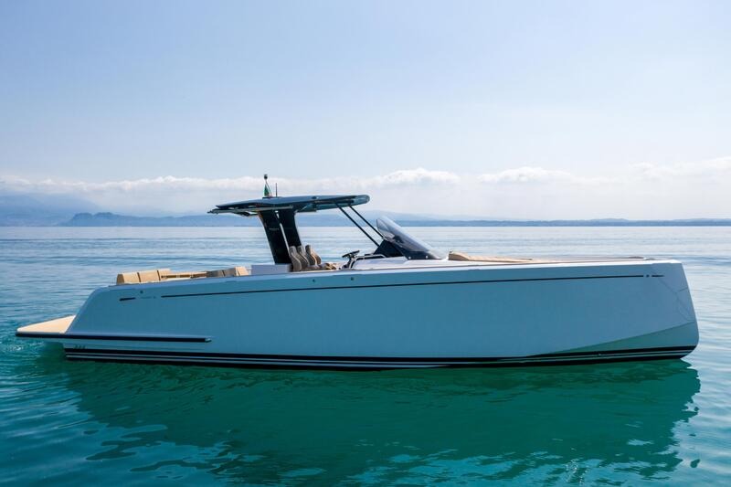 Pardo 38 in charter anchored in Mallorca. Sunny day. Turquoise water.