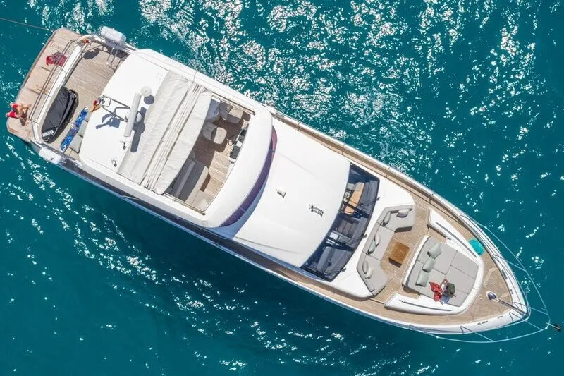 bird eye view of a yacht in charter in Mallorca. Sunny day, turquoise water.
