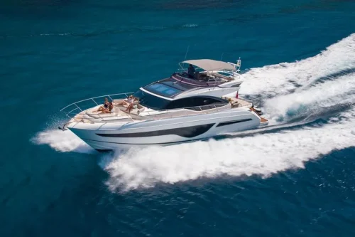 Yacht in charter cruising in Mallorca. Princess S66 has a Flybridge.
