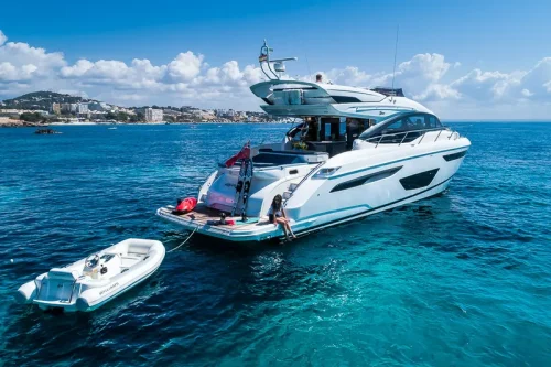 Princess yacht anchored in turquoise water in Mallorca.